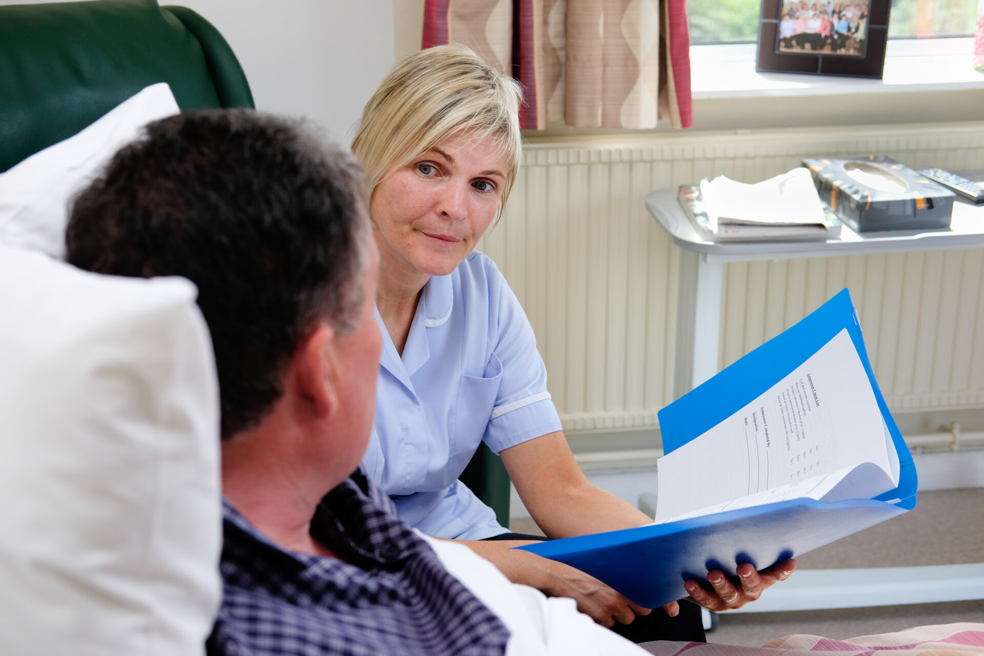 Nurse Reading Charts
